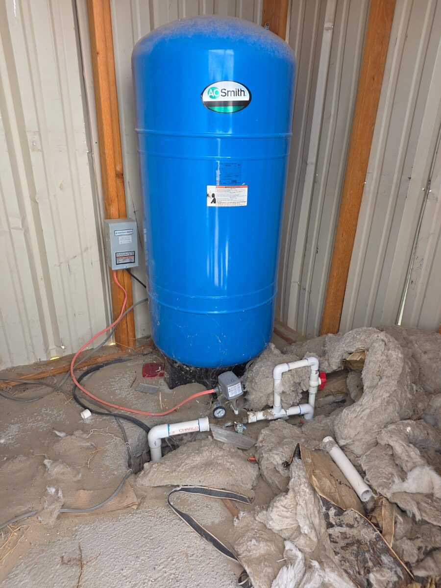 AO Smith well pressure tank in outbuilding